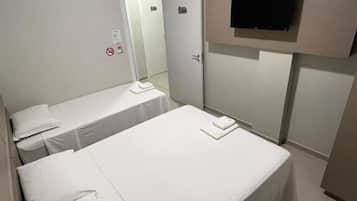 Desk, laptop workspace, blackout drapes, soundproofing