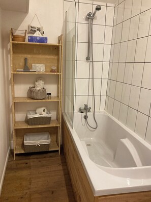 Shower, hair dryer, soap, shampoo