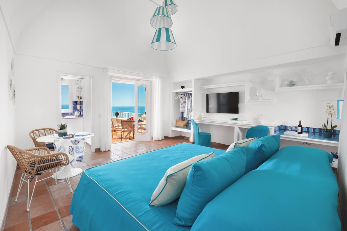 Suite, vista al mar | Escritorio y wifi gratis