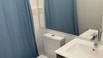 Hair dryer, towels, soap, toilet paper