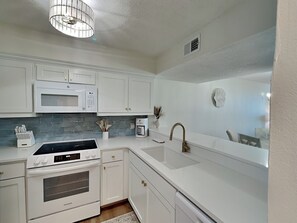 Fridge, microwave, oven, stovetop - Dunes of Panama #C503 | Gulf Front + Amenities (Panama City Beach)