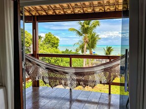 Quarto quádruplo superior, sacada, vista para o mar | Parte interna