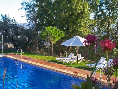 Gemütliches Haus in einer Anlage mit Garten und Schwimmbad. by Interhome