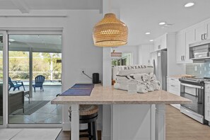 Fridge, microwave, oven, stovetop - 3 Bedroom, 3 Bath Pool Home in the Distinguished Sanibel Golf Club (Sanibel)