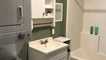 Hair dryer, towels, soap, shampoo