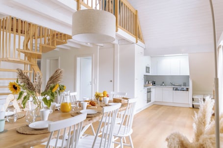 Dining. Soluna Stay | Lakefront Penthouse | Pilatus & Rigi view | Lucerne | Swiss Alps