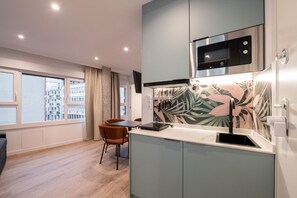 Fridge, microwave, stovetop, coffee/tea maker - 307 — SB20 Boutique Studios | 1BR | 1BA | W/K (Madrid)