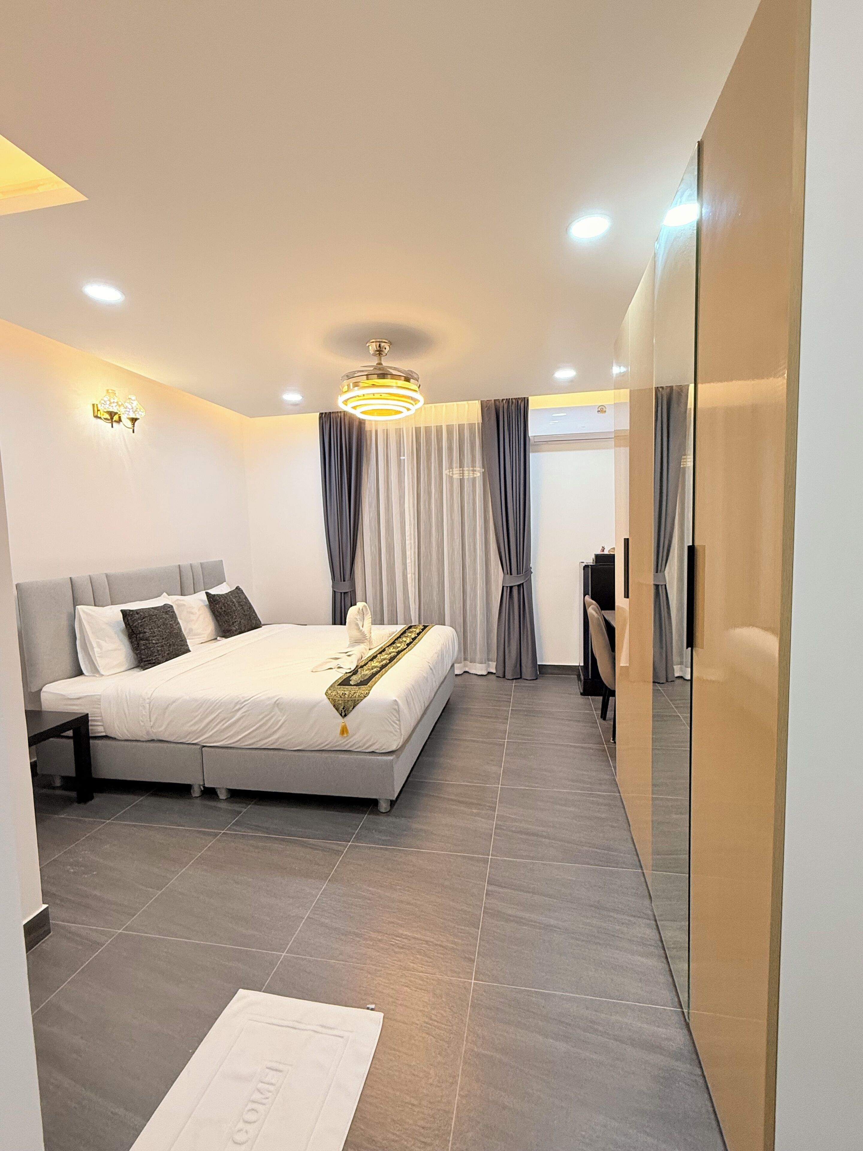 Premium bedding, desk, laptop workspace, free WiFi