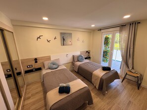 3 chambres, coffres-forts dans les chambres, Wi-Fi gratuit