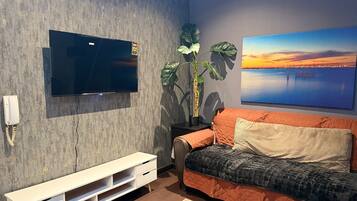 City Apartment, Balcony, City View | Living area