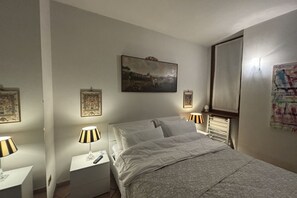 1 habitación, tabla de planchar con plancha, wifi gratis y ropa de cama