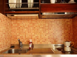 Fridge, cookware/dishes/utensils - Studio-Apartment mit Seeblick by Interhome (Desenzano)