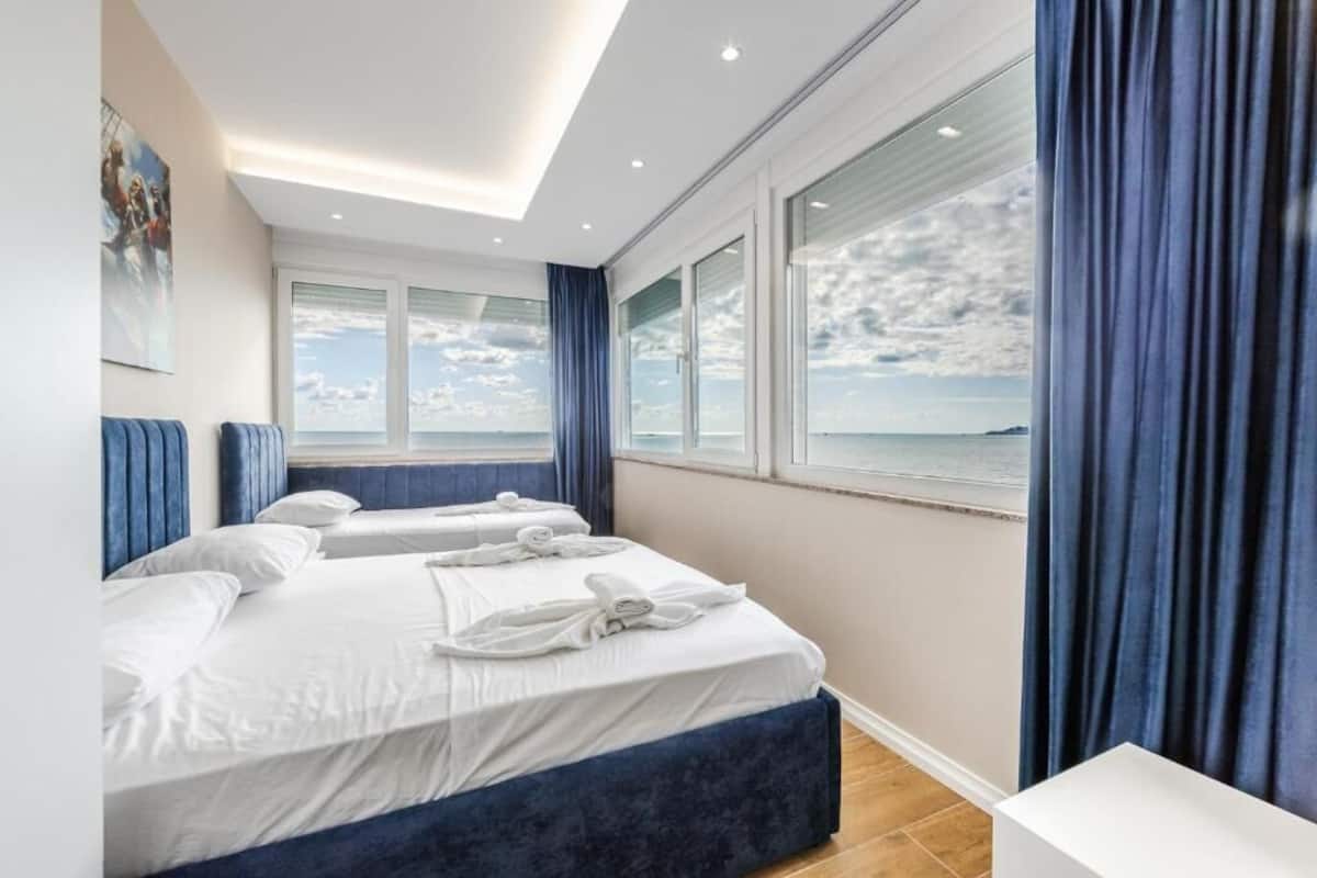 Apartment, Sea View | Blackout drapes, iron/ironing board, free WiFi