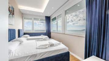 Apartment, Sea View | Blackout drapes, iron/ironing board, free WiFi