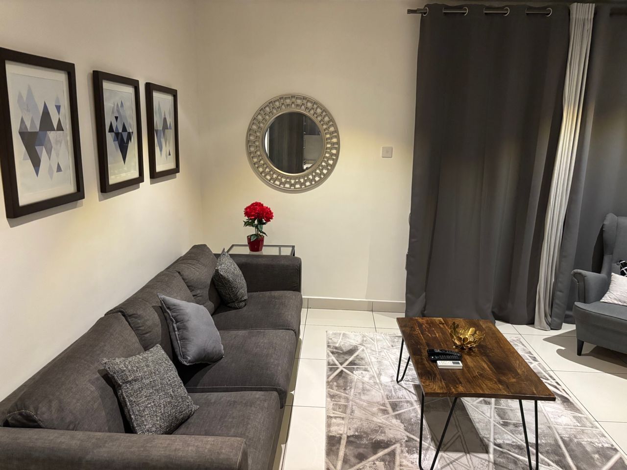 Apartamento Deluxe, vistas a la ciudad | Zona de estar