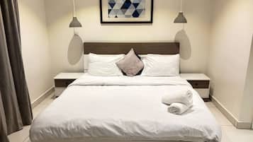 Deluxe-huoneisto, kaupunkinäköala | Silitysrauta/-lauta, ilmainen Wi-Fi