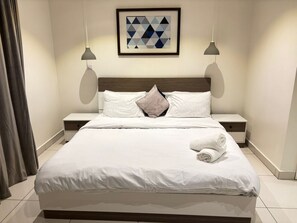 Apartamento Deluxe, vistas a la ciudad | Tabla de planchar con plancha y wifi gratis