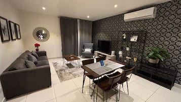 Deluxe-huoneisto, kaupunkinäköala | Oleskelualue