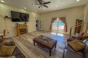 TV, fireplace - Lakefront Retreat, Deck, Private Docks & Kayaks (Columbiaville)