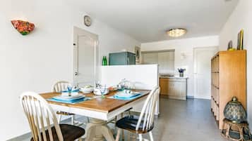 Appartement, uitzicht op tuin | Dineren