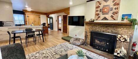 Smart TV, fireplace, books
