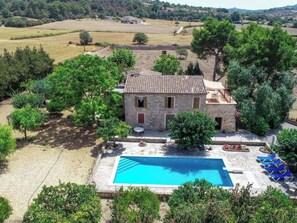 A stone house with a swimming pool, surrounded by trees and open fields. - Manenta by Interhome (Manacor)