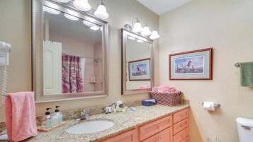 Hair dryer, towels, soap, shampoo