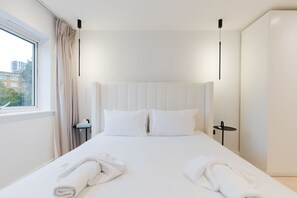 2 habitaciones, tabla de planchar con plancha, internet y ropa de cama 