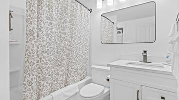 Hair dryer, towels, soap, shampoo