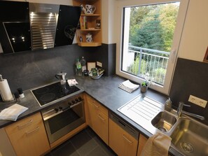 Fridge, microwave, oven, dishwasher - Tolles Appartement in Mastershausen mit Terrasse, Grill und Garten by Interhome (Mastershausen)
