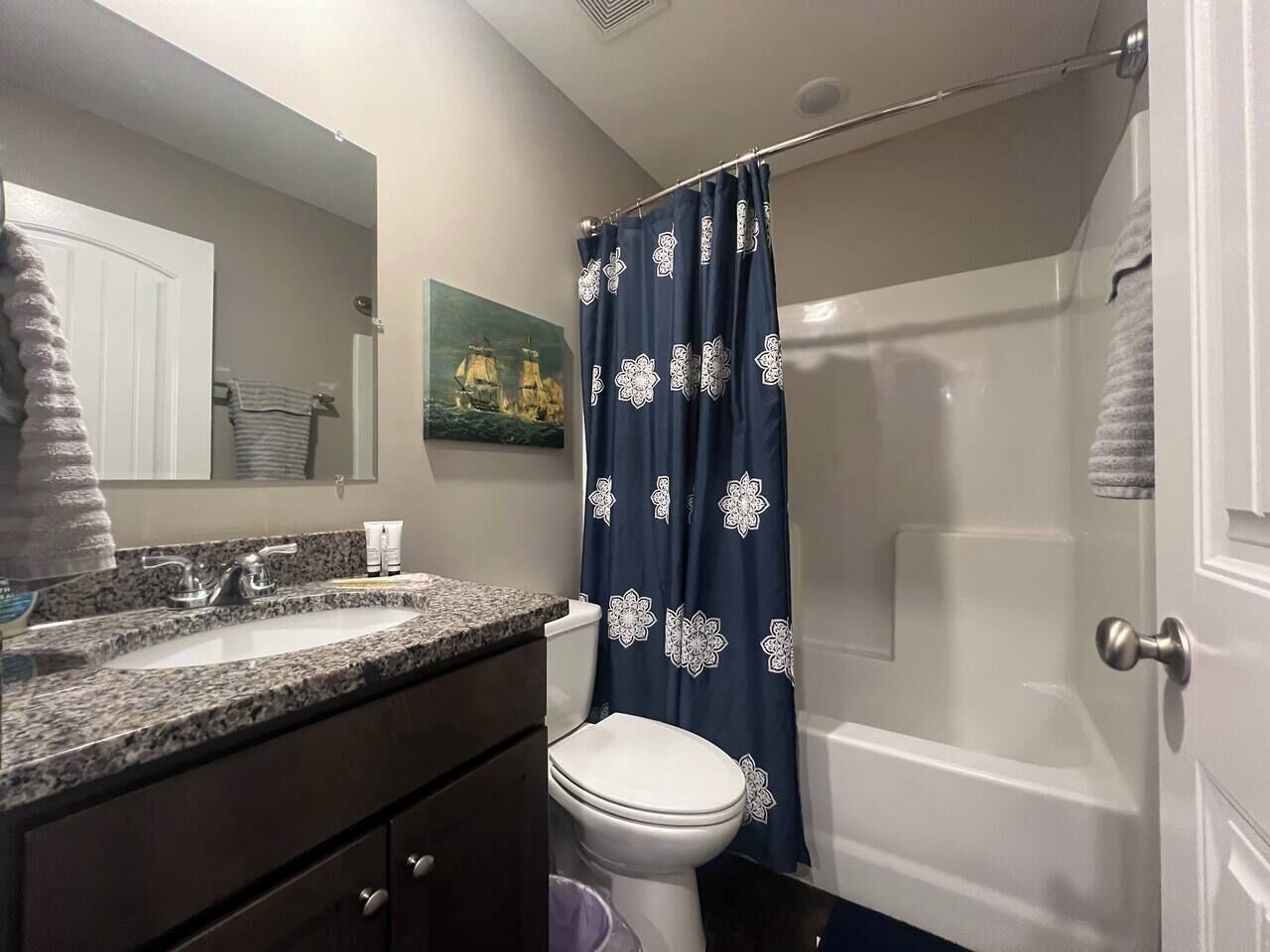 Hair dryer, towels, soap, toilet paper