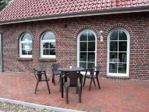 Outdoor dining - direkt am Wasser in Dornum Westerbur by Interhome (Nessmersiel)