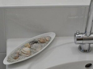 A bathroom sink with a white basin and a chrome faucet. - Residenz Alpenrose25 by Interhome (Sils Maria)