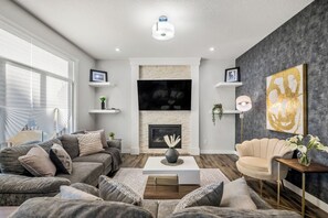 Smart TV, fireplace, foosball