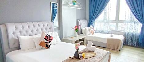 Apartamento básico, 1 habitación, no fumadores, vistas a la ciudad | Ropa de cama de alta calidad y cortinas opacas