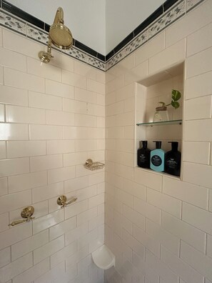 Shower, eco-friendly toiletries, hair dryer, towels