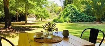 Secluded cottage with outdoor bath, river access, bikes, and farm animals.