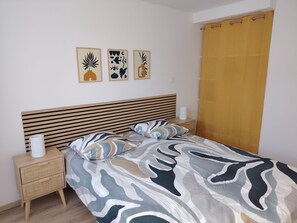 2 dormitorios, tabla de planchar con plancha, wifi gratis y ropa de cama