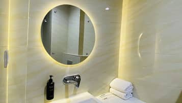 Superior Room | Bathroom | Shower, slippers, toilet paper