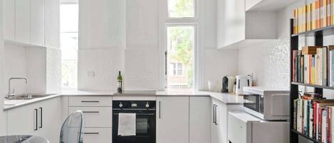 Fridge, microwave, oven, cookware/dishes/utensils