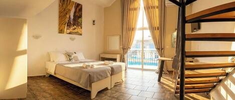 Traditional Duplex, Balcony | In-room safe, blackout drapes, iron/ironing board, free rollaway beds
