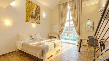 Traditional Duplex, Balcony, Partial Sea View | In-room safe, blackout drapes, iron/ironing board, free WiFi