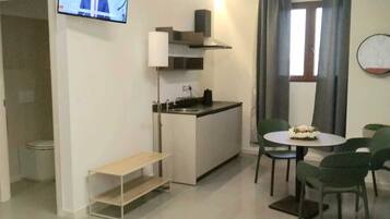 Habitación con 1 cama matrimonial o 2 individuales, cocineta | Interior