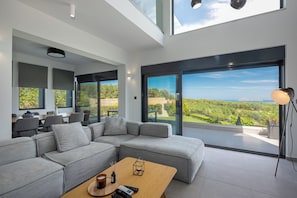 Villa Deluxe, vue mer | Coin séjour