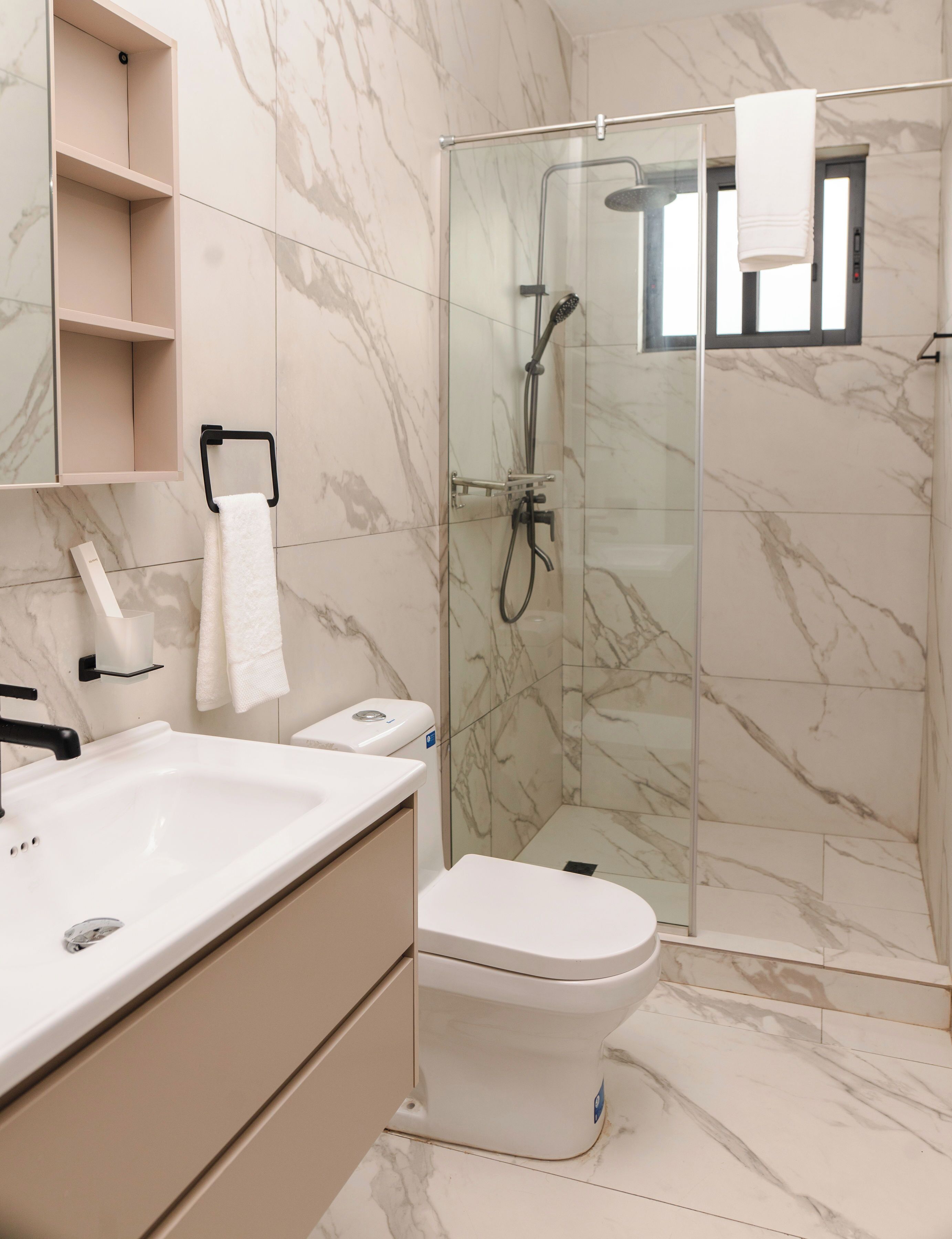 Deluxe Apartment, City View | Bathroom | Shower, towels, soap, toilet paper