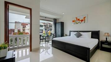 Deluxe Double Room, Balcony, City View | In-room safe, desk, soundproofing, free WiFi