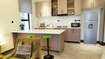 Panoramic Apartment, 1 Bedroom, Balcony, Hill View | Private kitchen | Full-size fridge, microwave, oven, stovetop