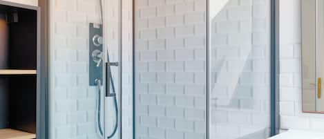 Shower, hair dryer, towels, soap