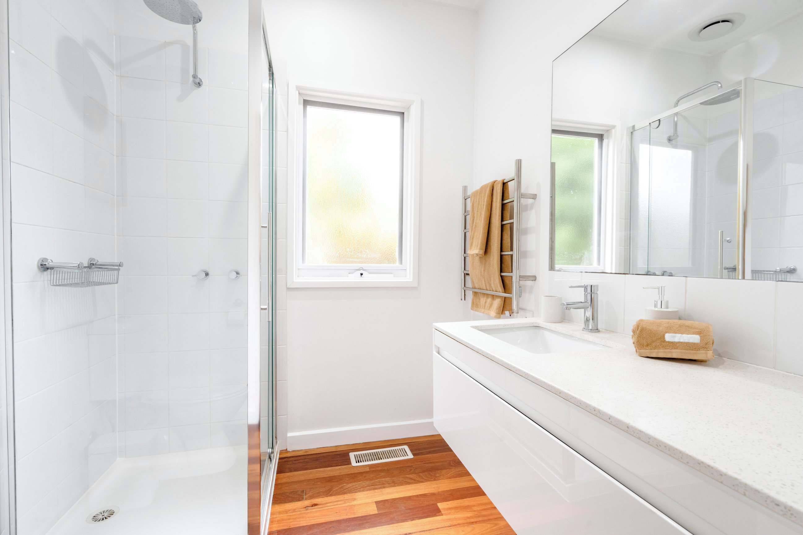 Shower, hair dryer, towels, shampoo