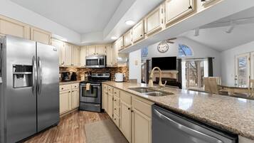 Coffee/tea maker, fridge, microwave, oven